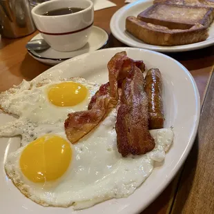 French Toast with 2 Eggs and Meat.