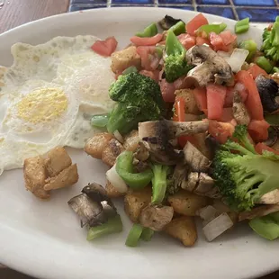 Veggie hash with over easy eggs - delish