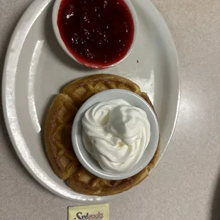 &quot;Belgian Waffle&quot; saddest excuse for a waffle I&apos;ve seen. With artificial fruits on the side