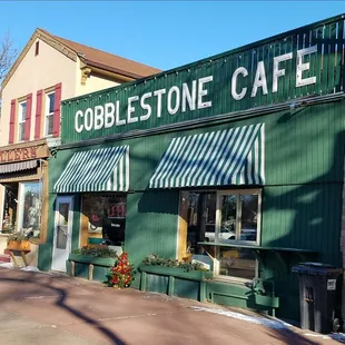 cobblestone cafe on a sunny day