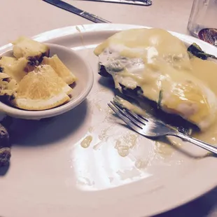 The Veggie Benedict with fresh fruit (optional sausage links). Tomato and spinach in place of the ham!