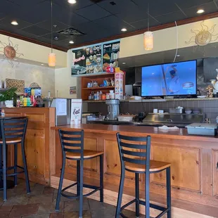 Counter seating as well as booths.