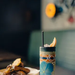 a drink and a plate of food