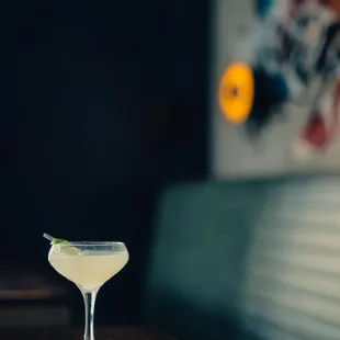 a cocktail in a glass on a table