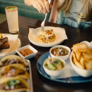 a woman eating a meal