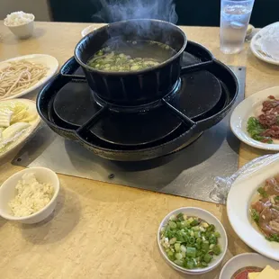 noodles, assorted veggies, soup, beef, chicken, rice and butter