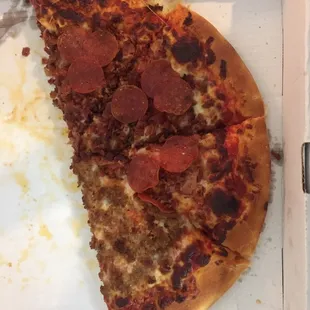 Half pepperoni and bacon, half sausage.