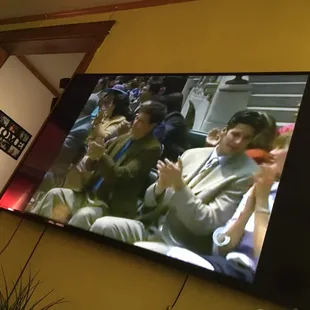 a group of people clapping