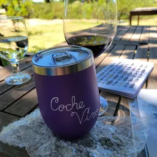 a glass of wine on a table