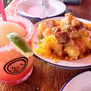 Frozen strawberry margarita. 5 stars. Green chile pork bellies tator tots. 4 stars.