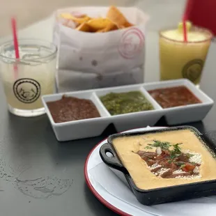 Coin margarita, spicy pineapple margarita, Chips &amp; Salsas, and queso