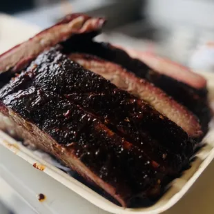 ribs in a styrofoam container