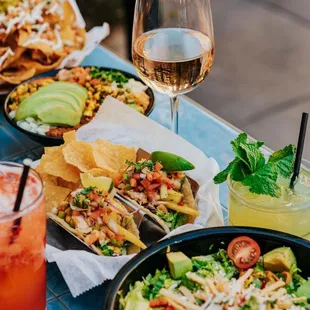 a table full of food and drinks