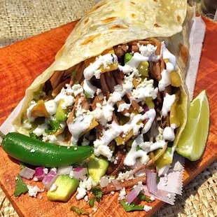 Crispy Chilaquiles Burrito ( extra sour Oaxaqueña Cream )