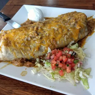 Chile Verde wet burrito. Pork was very tasty, salsa was very tasty, but needed more heat. Salad, fresh &amp; crunchy. Nice.