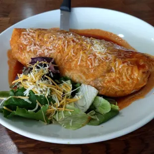 Carne Asada wet burrito. Meat was tasty and tender, beans inside were good, salad was fresh and cooling.