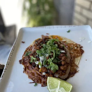 Al pastor and cheese taco