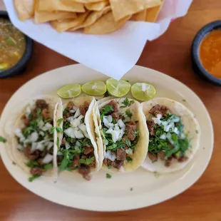 Street style tacos, choose your meat asada, pollo, al pastor, birria, chorizo, carnitas