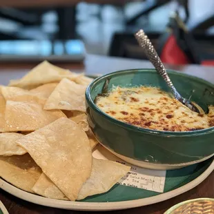 Chile con queso - excellent chips and a nice spicy mixture of peppers and cheese.