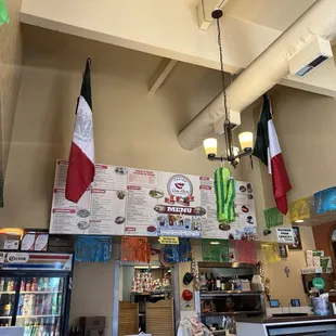 Menu over the ordering counter. Super hungry going for the Carne Asada Burrito Supreme!