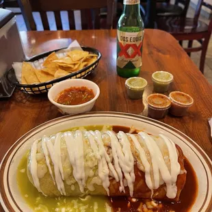 a mexican burrito with a side of tortillas