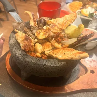 Molcajete.    One of only a few places in Oklahoma that I have found to serve this dish.