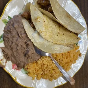 Tacos Al pastor with rice and beans