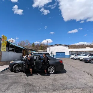 Lots of parking and down a lane filled with car shop businesses