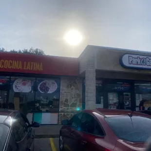 Next to the Chevron gas station