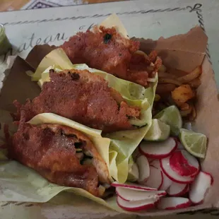 4 keto tacos (one hiding under the back one, next to the grilled onions). I can't express how unique and delicious these were!