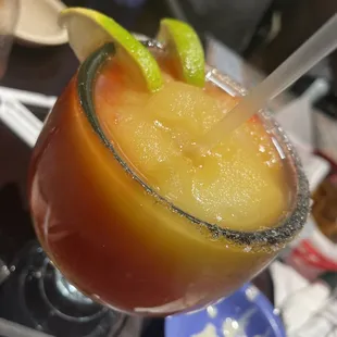 Strawberry, peach mango frozen margarita! Sugar not salt