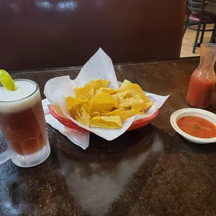 nachos, chips and a drink