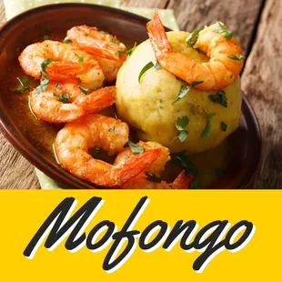 a plate of shrimp and potatoes