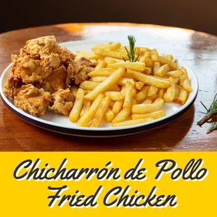 a plate of fried chicken and fries