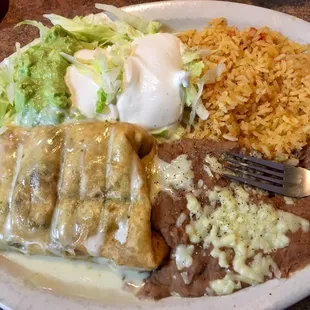 Soggy chimichanga, dry beans, and barely mashed guacamole.