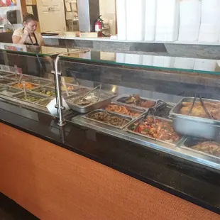a buffet with a variety of food items