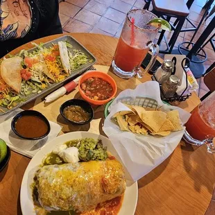 a table full of mexican food
