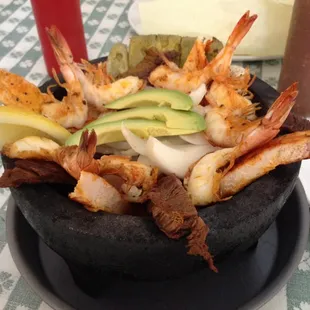Mixed Molcajete with shrimp, steak, chicken and chorizo sausage.  This is sooooo good!!!! Definitely worth every penny!!