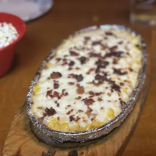 a pizza on a wooden board