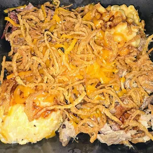 The Mess Plate.  Chose half Mac &amp; Cheese, half Cheese Potatoes, half Pulled Pork, half Brisket, original BBQ sauce, and Haystack Onions