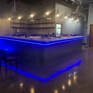 a bar with blue lights