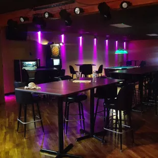 a bar with purple lighting