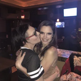 High top table, television, middle bar.