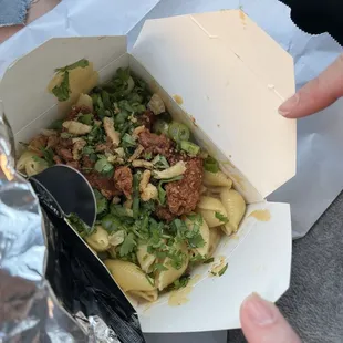 Szechuan level, green chili chicken, macaroni and cheese