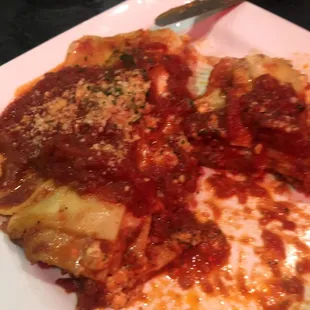 Remaining half of a large slice of lasagna that my sister enjoyed.
