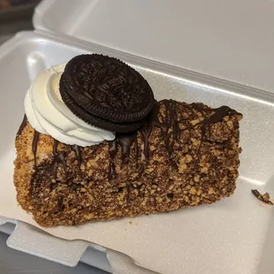 a slice of oreo cheesecake