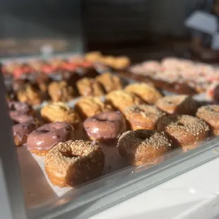 a variety of doughnuts on display