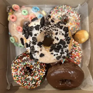 a variety of donuts in a box