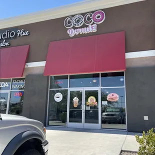 the outside of a donut shop