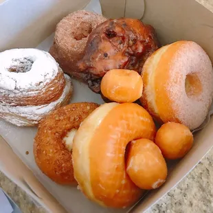 a variety of donuts in a box